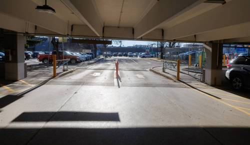 MIKE DEAL / FREE PRESS The entrance and exit for vehicles into the parkade is open with no security presence at the time of visit around noon on Thursday. The parkade across the street from St. Boniface Hospital where a person was sexually assaulted on November 8th. Reporter: Malak Abas 251120 - Thursday, November 20, 2025.