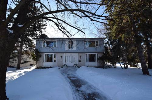 Todd Lewys / Free Press
                                Situated on a huge, mature corner lot in the heart of Tuxedo, the 3,511-sq.-ft., two-storey home is full of updates and modern functionality.