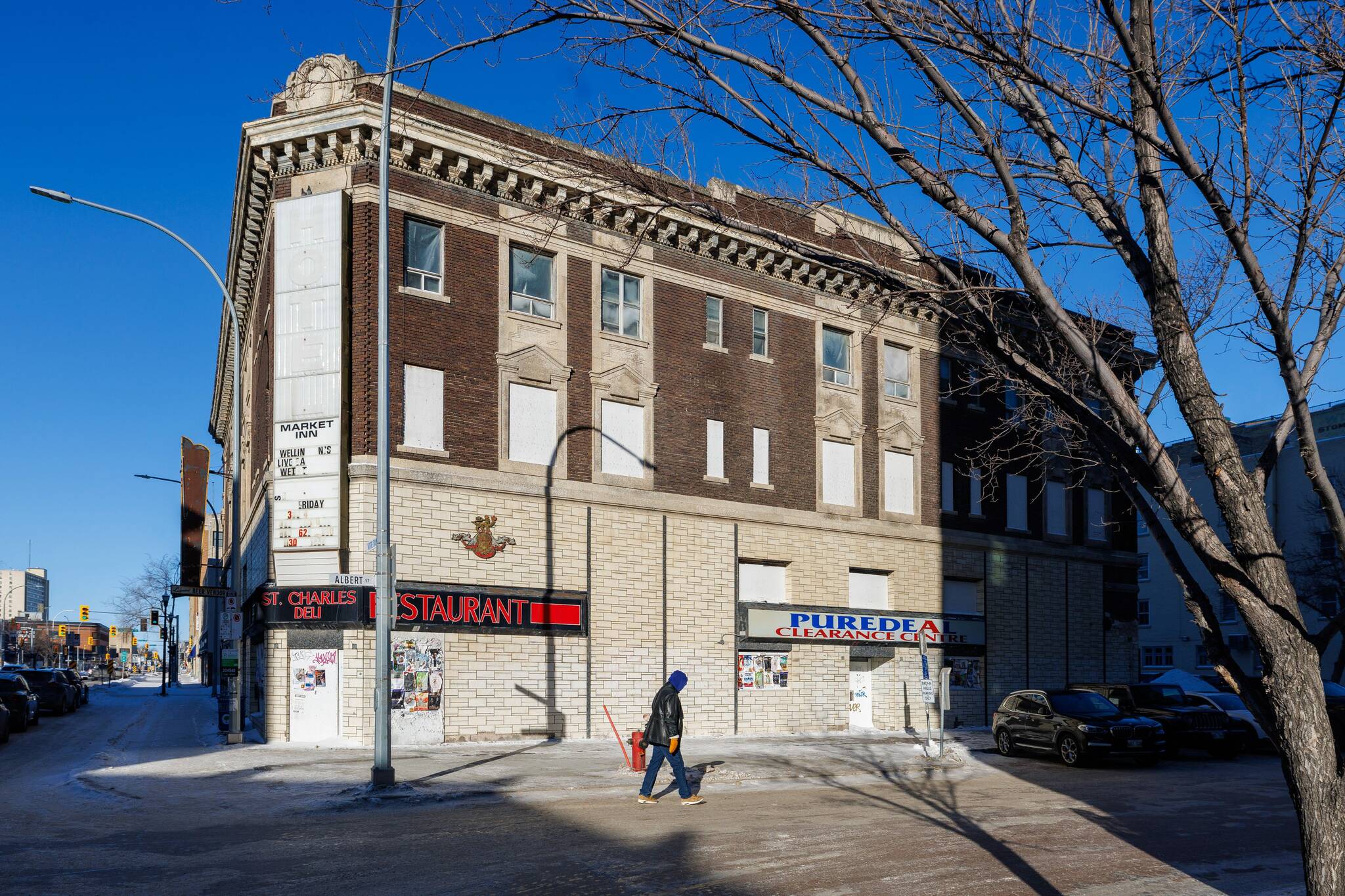 Building blocks: the history behind four historic downtown buildings set for redevelopment