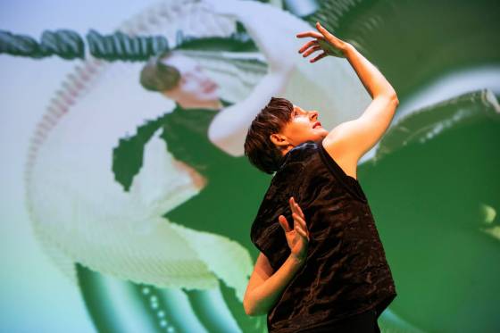 Freya Olafson embraces glitch and error while projecting overlapping versions of her body behind her. (Mikaela MacKenzie / Free Press)