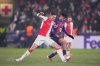 Barcelona's Pedri, right, is challenged by Slavia's Lukas Provod during the Champions League opening phase soccer match between Slavia Prague and Barcelona in Prague, Czech Republic, Wednesday, Jan. 21, 2026. (AP Photo/Petr David Josek)