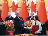 Canadian Prime Minister Mark Carney, back left, and Premier of China Li Qiang, back right, look on as Minister of Agriculture and Agri-Food Heath MacDonald, front left, and Sun Meijun, Minister of the General Administration of Customs in China take part in a signing ceremony at the Great Hall of the People in Beijing, China on Thursday, Jan. 15, 2026. THE CANADIAN PRESS/Sean Kilpatrick