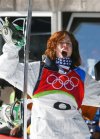 FILE - United States Shaun White reacts after seeing his score on the first run of the Men's Halfpipe Snowboard competition at the Turin 2006 Winter Olympic Games in Bardonecchia, Italy Sunday, Feb. 12, 2006. White's 46.8 held up to give him the gold medal. (AP Photo/Lionel Cironneau, File)