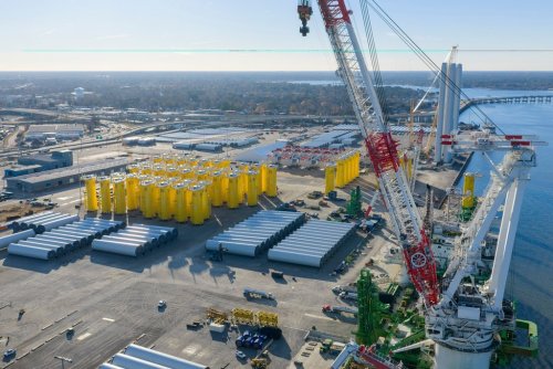 FILE - Wind turbine bases, generators and blades sit along with support ships at The Portsmouth Marine terminal that is the staging area for Dominion Energy Virginia, which is developing Coastal Virginia Offshore Wind, Dec. 22, 2025, in Portsmouth, Va. (AP Photo/Steve Helber, File)