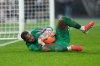 AC Milan's goalkeeper Mike Maignan saves the ball during the Serie A soccer match between Roma and AC Milan in Rome, Sunday, Jan. 25, 2026. (AP Photo/Gregorio Borgia)