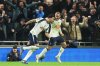 Tottenham's Dominic Solanke, left, celebrates scoring his side's 2nd goal with Xavi Simons during the English Premier League soccer match between Tottenham Hotspur and Manchester City in London, Sunday, Feb. 1, 2026. (AP Photo/Richard Pelham)
