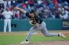 FILE - Chicago White Sox's Mike Clevinger pitches in the eighth inning of a baseball game against the Cleveland Guardians in Cleveland, April 8, 2025. (AP Photo/Sue Ogrocki, File)