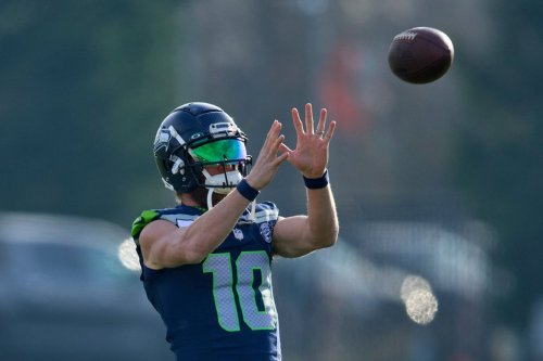 Seattle Seahawks wide receiver Cooper Kupp catches a ball during practice Thursday, Jan. 22, 2026, in Seattle at the team's facilities ahead of the NFL football NFC Championship game against the Los Angeles Rams. (AP Photo/John Froschauer)