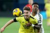 FILE - Real Madrid's Vinicius Junior vies for the ball with Villarreal's Juan Foyth, left, during a Spanish La Liga soccer match between Villarreal and Real Madrid in Villarreal, Spain, Saturday, March 15, 2025. (AP Photo/Alberto Saiz, File)