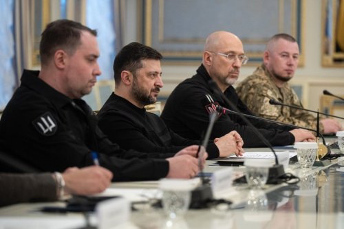 President of Ukraine Volodymyr Zelenskyy, second left, listens to British Defense Secretary John Healey during their meeting in Kyiv, Ukraine, Friday, Jan. 9, 2026. (AP Photo/Danylo Antoniuk)