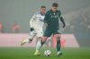 Napoli's Giovanni Di Lorenzo, right, and FC Copenhagen's Elias Achouri battle for the ball during the Champions League group stage soccer match between FC Copenhagen and Napoli in Copenhagen, Tuesday, Jan. 20, 2026. (Liselotte Sabroe/Ritzau Scanpix via AP)
