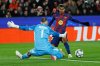 Barcelona's Lamine Yamal fights for the ball against Copenhagen's goalkeeper Dominik Kotarski during the Champions League opening phase soccer match between Barcelona and Copenhagen in Barcelona, Spain, on Wednesday, Jan. 28, 2026. (AP Photo/Joan Monfort)