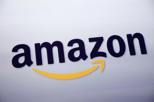 FILE - The Amazon logo is displayed at a news conference in New York on Sept. 28, 2011. (AP Photo/Mark Lennihan, File)