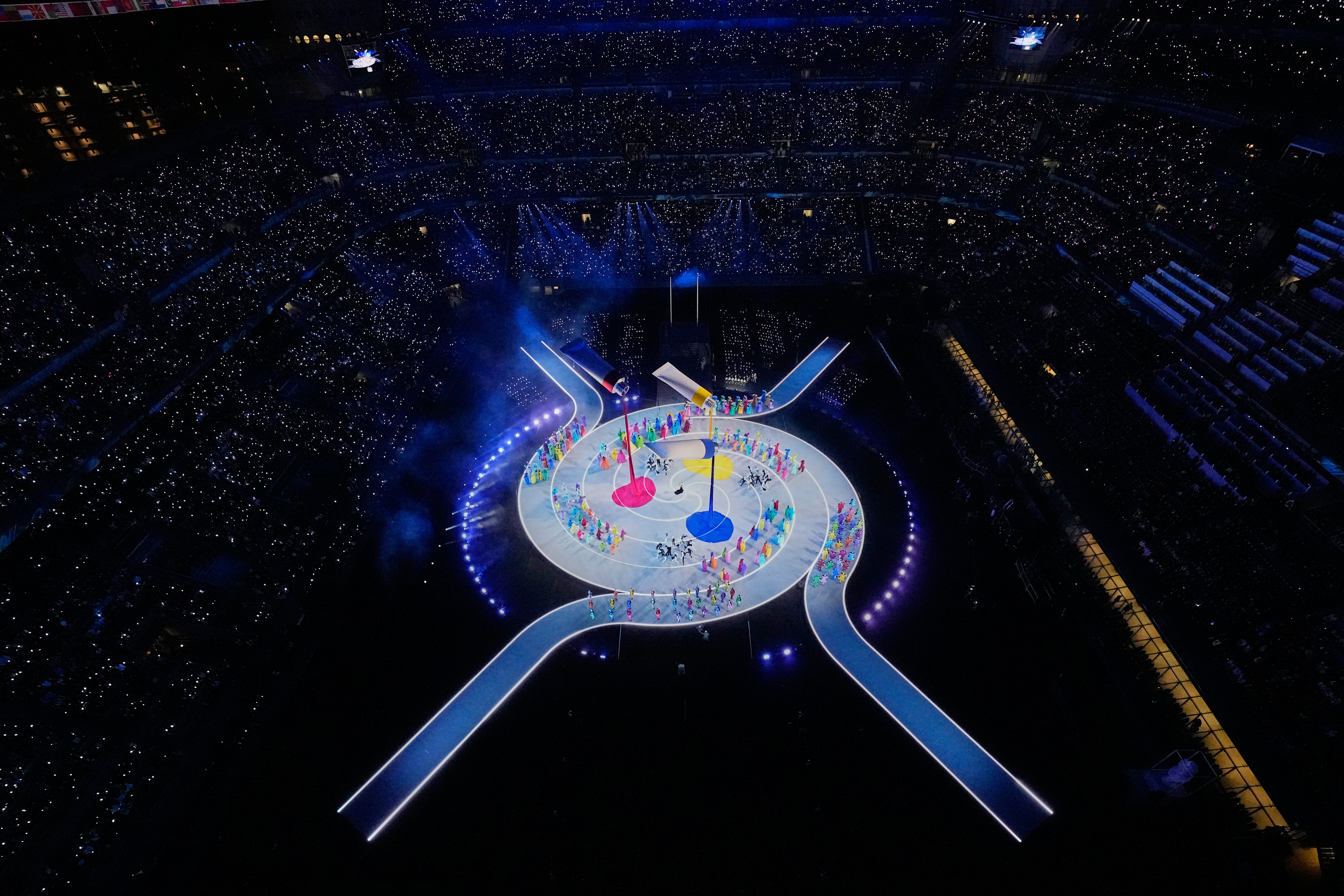 The Latest: Two cauldrons are lit for the first time at a Winter Olympics – Winnipeg Free Press