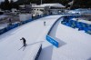 Athletes participate in a biathlon training session at the 2026 Winter Olympics in Anterselva, Italy, Friday, Feb. 6, 2026. (AP Photo/Mosa'ab Elshamy)