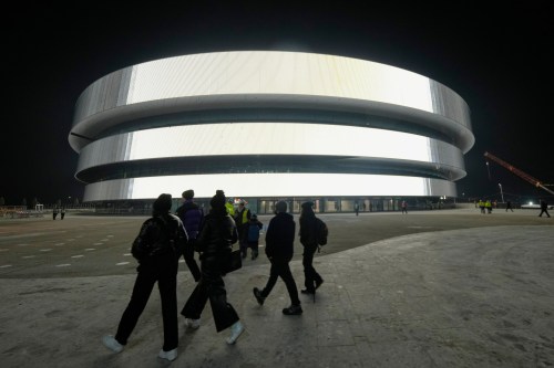 FILE - An outside view of the Santa Giulia Ice Hockey Arena, ahead of the 2026 Winter Olympics, in Milan, Italy, Friday, Jan. 9, 2026. (AP Photo/Luca Bruno, File)