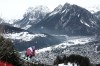 Canada's James Crawford speeds down the course during an alpine ski, men's downhill official training, at the 2026 Winter Olympics, in Bormio, Italy, Friday, Feb. 6, 2026. (AP Photo/Gabriele Facciotti)