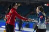 Team Canada skip Kerri Einarson, left, and Nova Scotia skip Christina Black shake hands after a game at the Scotties Tournament of Hearts in Kamloops, B.C., on Feb. 25, 2023. THE CANADIAN PRESS/Darryl Dyck