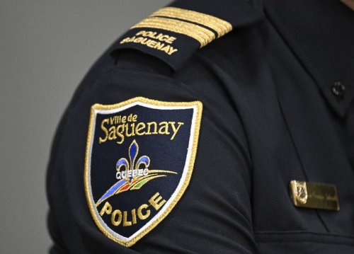 The Saguenay police forces patch at a news conference, in Quebec City, Thursday, Feb. 29, 2024. THE CANADIAN PRESS/Jacques Boissinot