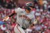 FILE - San Francisco Giants' Jung Hoo Lee hits a single during the third inning of a baseball game against the St. Louis Cardinals, Sept. 6, 2025, in St. Louis. (AP Photo/Jeff Roberson, File)