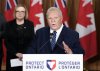 Ontario Premier Doug Ford speaks to the media regarding the federal government's decision to allow Chinese EVs into Canada at Queen's Park in Toronto on Wednesday, Jan. 21, 2026. THE CANADIAN PRESS/Nathan Denette