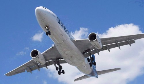 An Air Transat Airbus A330 lands at Montreal's Trudeau airport, Sunday, July 31, 2016. THE CANADIAN PRESS/Graham Hughes