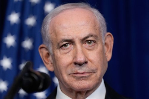 Israel's Prime Minister Benjamin Netanyahu listens during a news conference with President Donald Trump at Mar-a-Lago, Monday, Dec. 29, 2025, in Palm Beach, Fla. (AP Photo/Alex Brandon)