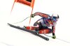 Canada's James Crawford speeds down the course during a men's alpine ski World Cup downhill, in Kitzbuehel, Austria, Saturday, Jan. 24, 2026. (AP Photo/Gabriele Facciotti)