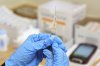 A pharmacist prepares to administer a dose of seasonal flu vaccine to a patient at a CVS Pharmacy in Miami, Tuesday, Sept. 9, 2025. (AP Photo/Rebecca Blackwell)