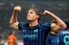 Inter Milan's Francesco Pio Esposito celebrates after scoring his side's opening goal during the Serie A soccer match between Inter Milan and Lecce in Milan, Italy, Wednesday, Jan. 14, 2026. (AP Photo/Luca Bruno)