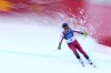 Canada's James Crawford arrives at the finish area of an alpine ski, men's downhill official training, at the 2026 Winter Olympics, in Bormio, Italy, Friday, Feb. 6, 2026. (AP Photo/Rebecca Blackwell)