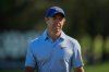 Rory McIlroy of Northern Ireland walks down the 16th fairway during the first round of the Dubai Desert Classic in United Arab Emirates, Thursday, Jan. 22, 2026. (AP Photo/Altaf Qadri)