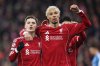 Liverpool's Florian Wirtz, left, celebrates with Liverpool's Hugo Ekitike after scoring his side's second goal during the Champions League soccer match between Liverpool and Qarabag in Liverpool, Wednesday, Jan. 28, 2026. (AP Photo/Darren Staples)