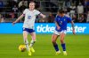 FILE - United States midfielder Rose Lavelle (16) stops Italy defender Valentina Bergamaschi (2) from advancing the ball during the first half of an international friendly soccer match Friday, Nov. 28, 2025, in Orlando, Fla. (AP Photo/John Raoux, File)