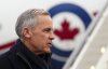 Prime Minister Mark Carney arrives in Zurich, Switzerland on Monday, Jan. 19, 2026, to attend the World Economic Forum in Davos. THE CANADIAN PRESS/Sean Kilpatrick
