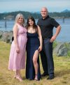 Piper James, 19, of Campbell River, B.C., was found dead on a beach in Australia, surrounded by a pack of dingoes. Piper's mother Angela, left to right, Piper James and Todd James pose in this undated handout photo, after Piper's graduation ceremony. THE CANADIAN PRESS/Handout - Angela James (Mandatory Credit)