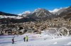 FILE - Olympic rings are displayed near a slope of the Stelvio Ski Center, venue for the alpine ski and ski mountaineering disciplines, at the 2026 Milan Cortina Winter Olympics, in Bormio, Italy, Jan. 16, 2025. (AP Photo/Luca Bruno, File)