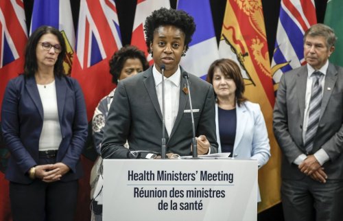 Manitoba Minister of Health Uzoma Asagwara, centre, addresses the media at a wrap-up news conference following a health ministers meeting in Calgary on Friday, Oct. 17, 2025. THE CANADIAN PRESS/Jeff McIntosh