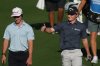 Blades Brown, right, reacts for a cheering gallery as he walks with David Ford as the gallery cheers for Brown who finished with a 12-under-par 60 during the second round of the American Express golf event at the Jack Nicklaus Tournament Course at PGA West Friday, Jan. 23, 2026, in La Quinta, Calif. (AP Photo/Ross D. Franklin)