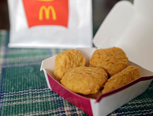 FILE - In this March 4, 2015, file photo, an order of McDonald's Chicken McNuggets is displayed for a photo in Olmsted Falls, Ohio. (AP Photo/Mark Duncan, File)