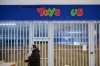 Shoppers pass a permanently closed Toys 'R' Us store in Toronto, on Wednesday, Feb. 4, 2026. THE CANADIAN PRESS/Sammy Kogan