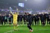 Brugge's goalkeeper Simon Mignolet, front left, celebrates with his team after their win during the Champions League opening phase soccer match between Club Brugge and Marseille in Bruges, Belgium, Wednesday, Jan. 28, 2026. (AP Photo/Geert Vanden Wijngaert)