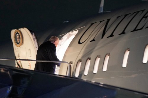President Donald Trump boards Air Force One at Palm Beach International Airport, Sunday, Jan. 11, 2026, in West Palm Beach, Fla. (AP Photo/Julia Demaree Nikhinson)