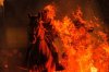 A man rides a horse through a bonfire as part of a ritual in honor of Saint Anthony the Abbot, the patron saint of domestic animals, in San Bartolome de Pinares, Spain, Friday, Jan. 16, 2026. (AP Photo/Manu Fernandez)