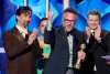 This image released by CBS Broadcasting shows James Weaver, from left, Chase Sui Wonders, Seth Rogen and Alex Gregory accepting the award for best TV series, musical or comedy for 