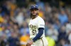 FILE - Milwaukee Brewers pitcher Freddy Peralta walks to the dugout after the top of the fifth inning in Game 2 of baseball's National League Championship Series against the Los Angeles Dodgers, Oct. 14, 2025, in Milwaukee. (AP Photo/Brynn Anderson, File)