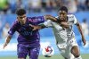 Charlotte FC defender Adilson Malanda, left, battles Toronto FC forward Hugo Mbongue for the ball in the first half of an MLS soccer match in Charlotte, N.C., Wednesday, Oct. 4, 2023. (AP Photo/Nell Redmond)