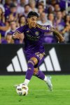 FILE - Orlando City forward Facundo Torres (10) brings the ball down field against Charlotte FC during the first half of a best-of-three first-round soccer match for MLS Cup, Sunday, Oct. 27, 2024, in Orlando, Fla. (AP Photo/Kevin Kolczynski,File)