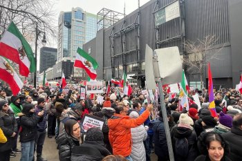 Attendees are seen during a rally to voice support for the Iranian people, in Montreal, Saturday, Jan. 10, 2026. A popular uprising sweeping across Iran neared the two-week mark Saturday. THE CANADIAN PRESS/Quentin Dufranne