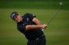 Patrick Reed of the United States plays his second shot on the 3rd hole during the final round of the Dubai Desert Classic in United Arab Emirates, Sunday, Jan. 25, 2026. (AP Photo/Altaf Qadri)